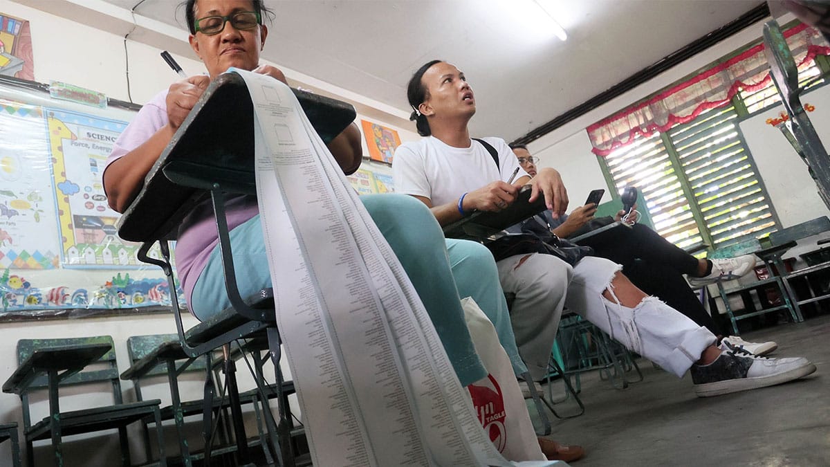 COUNTDOWN TO MAY 12 Poll watchers, teachers, electoral board members and technical staff from the Department of Education conduct the final inspection, testing and sealing of vote-counting machines and other election paraphernalia at Rafael Palma Elementary School in Manila on Monday, a week before the midyear elections. MARIANNE BERMUDEZ